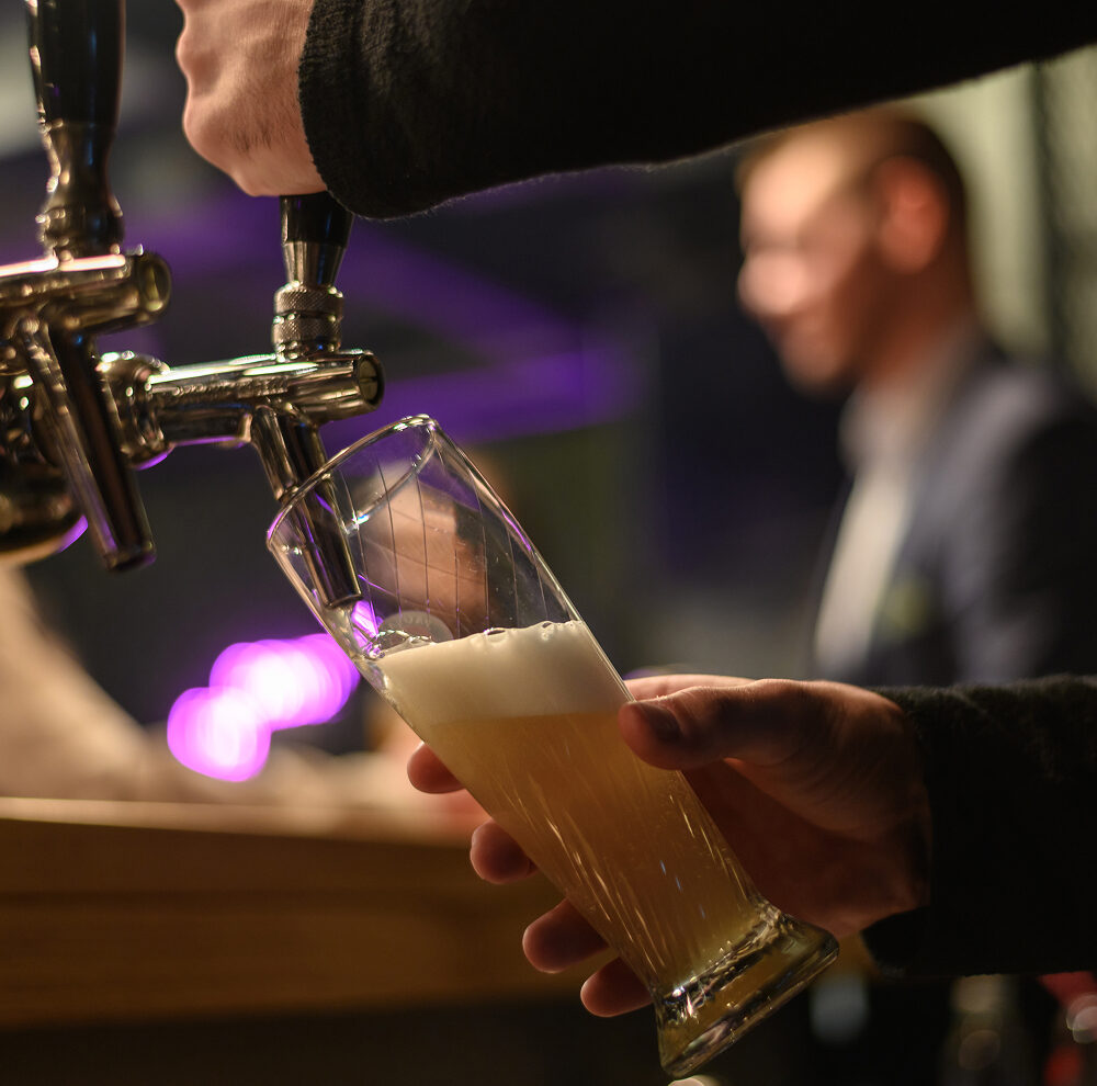 Beer being poured from a tap